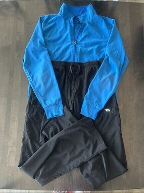 Elevate by IRG Blue Zip scrub jacket and black pants set. Medium. Pants MD/tall.
